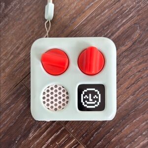 Retro Style Audio Device with Red Knobs